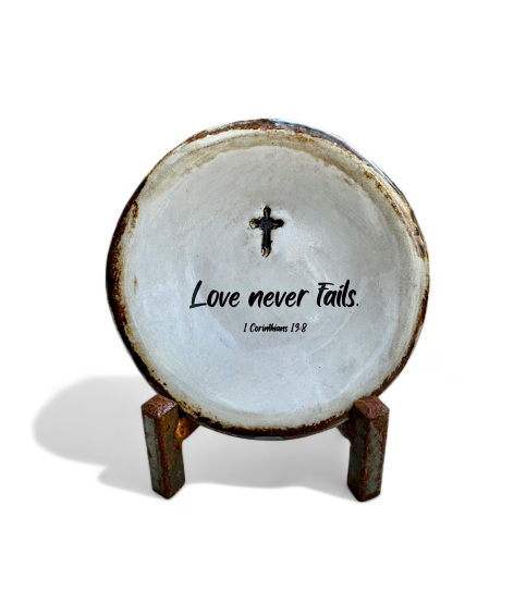 Love never fails.