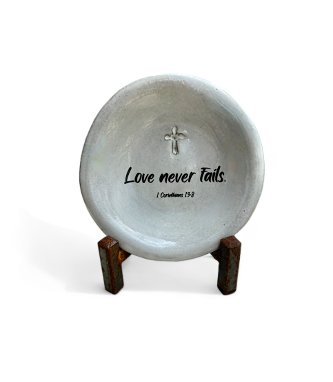 Love never fails.
