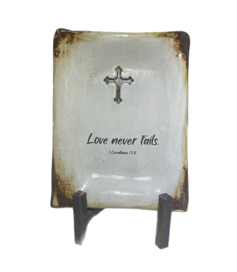 Love never fails.
